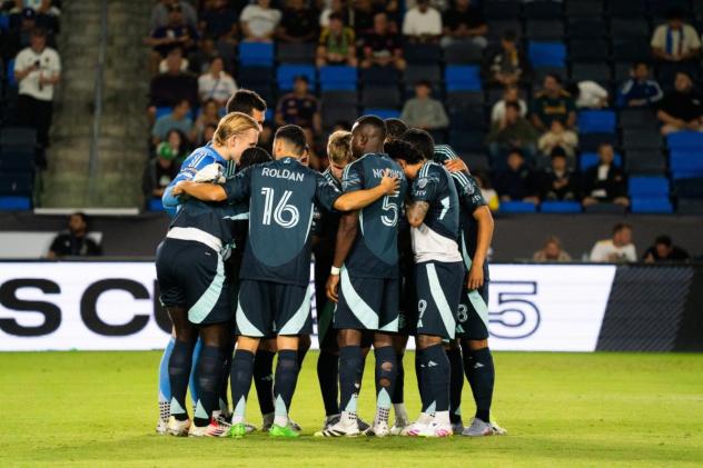 Sounders FC huddle