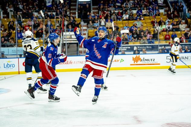 Kitchener Rangers celebrate after a goal against the Erie Otters