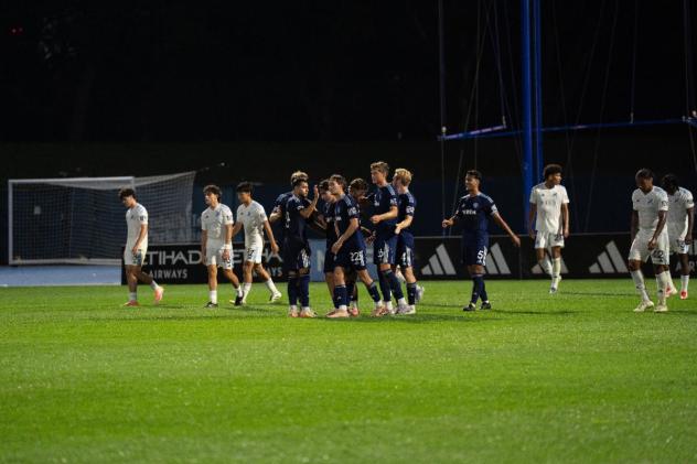 Chattanooga FC excahnges congratulations after a goal against New York City FC II