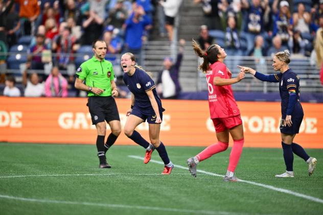 Maddie Dahlien of Seattle Reign FC reacts after her game-winning goal