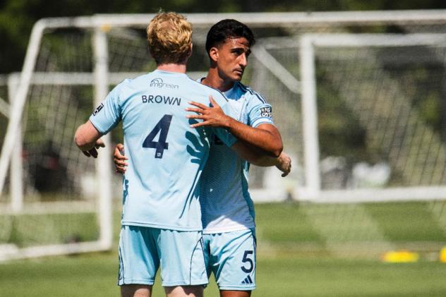 Chattanooga FC exchanges congratulations after beating Atlanta United 2