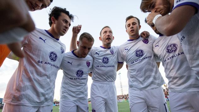 Louisville City FC huddle