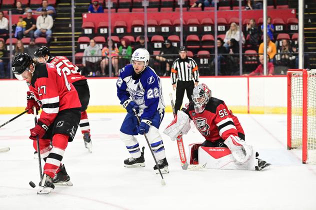 Syracuse Crunch left wing Jakob Pelletier vs. the Utica Comets