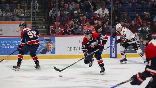 Saginaw Spirit right wing Nic Sima handles the puck against the Guelph Storm