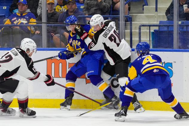 Vancouver Giants centre Jakob Oreskovic lays a hit along the boards