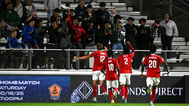Phoenix Rising's Charlie Dennis, Hope Avayevu, Collin Smith, and Jean-Éric Moursou on game night