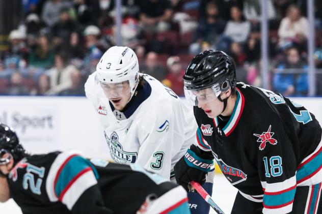 Seattle Thunderbirds' Ashton Cumby and Kelowna Rockets' Dawson Gerwing and Owen Folstrom on game night