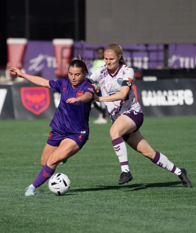 Calgary Wild FC midfielder Caleigh Boeckx (left) vs. Halifax Tides FC
