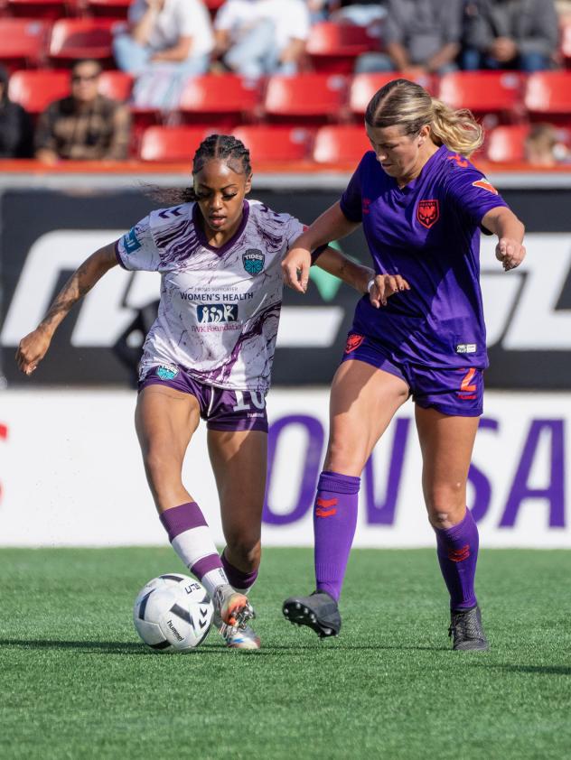 Calgary Wild FC defender Grace Stordy (right) vs. Halifax Tides FC