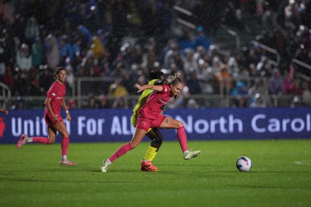 Natalie Jacobs of the North Carolina Courage battles for the ball