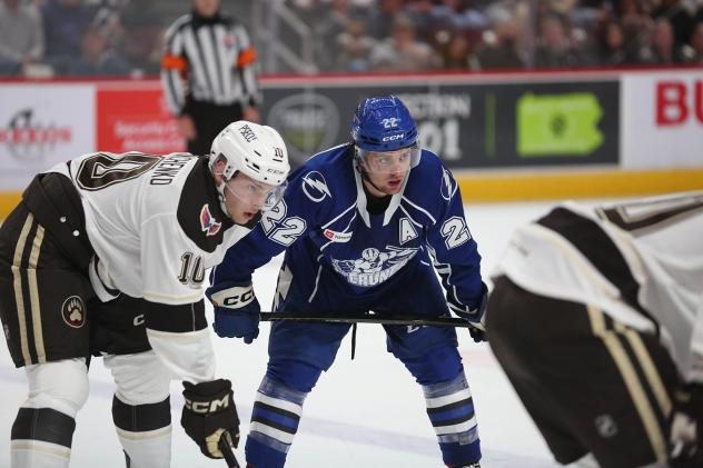 Syracuse Crunch left wing Jakob Pelletier (right)