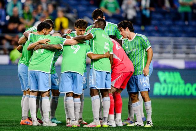 Sounders FC huddle