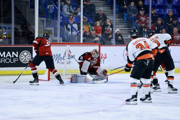 Vancouver Giants goaltender Burke Hood makes a stop against the Medicine Hat Tigers