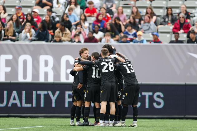 Atlético Ottawa huddle