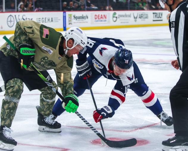 South Carolina Stingrays forward Kyler Kupka (right) faces off with the Savannah Ghost Pirates