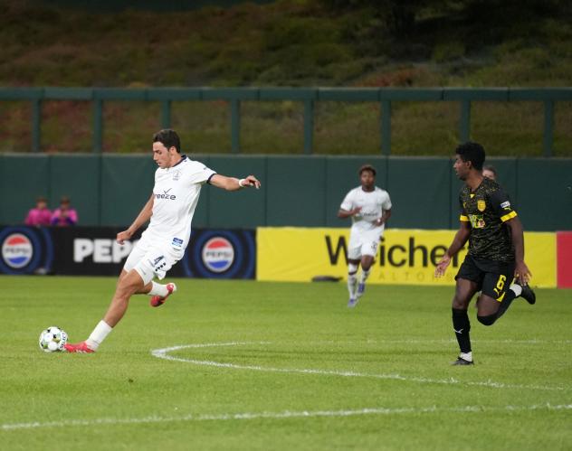 Rhode Island FC's Hugo Bacharach and New Mexico United's Gedion Zelalem on the field