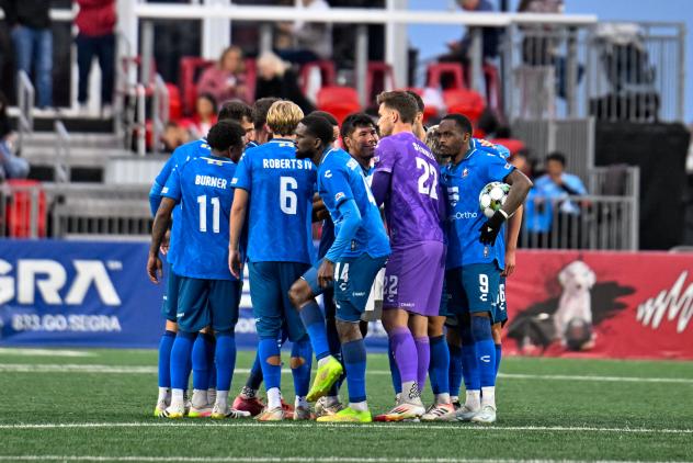 North Carolina FC huddles before the second half against Loudoun United FC