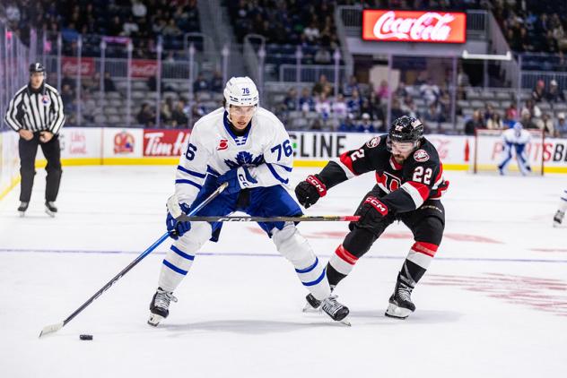 Belleville Senators centre Garrett Pilon (right) vs. the Toronto Marlies