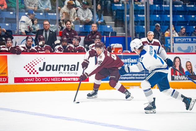 Peterborough Petes left wing Adam Novotný vs. the Sudbury Wolves