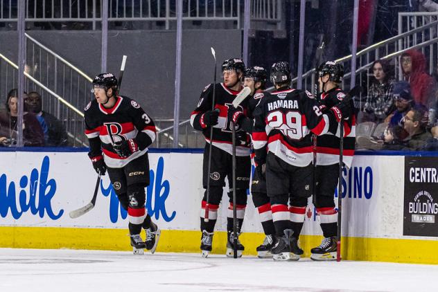Belleville Senators get together following a goal