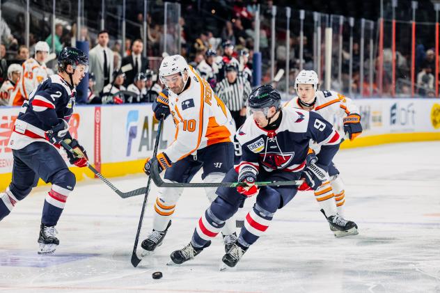 South Carolina Stingrays defensemen Romain Rodzinski (far left) and Reilly Webb