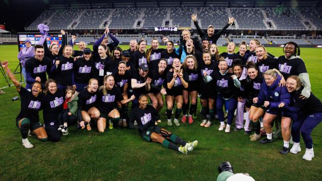 Racing Louisville FC pose after clinching a playoff berth