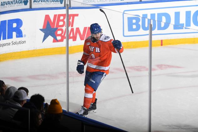 Syracuse Crunch left wing Wojciech Stachowiak reacts after a goal