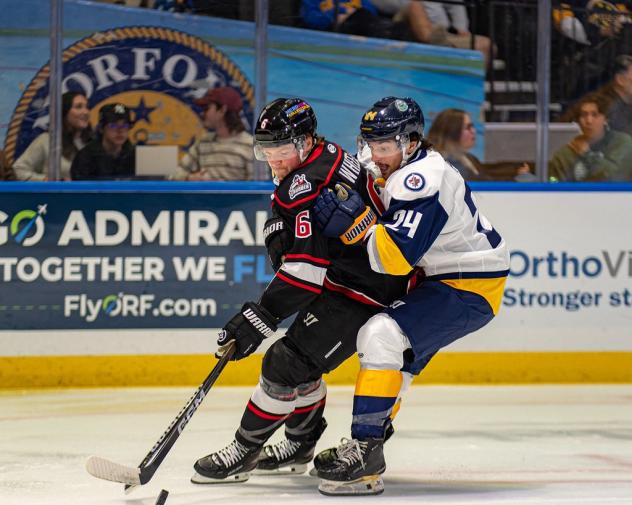 Adirondack Thunder defenseman Ryan Wheeler (left) vs. the Norfolk Admirals