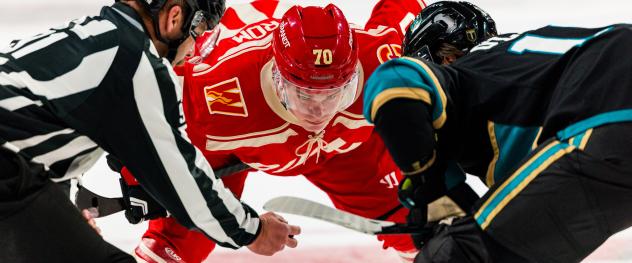 Rapid City Rush forward Rasmus Ekström faces off with the Tahoe Knight Monsters