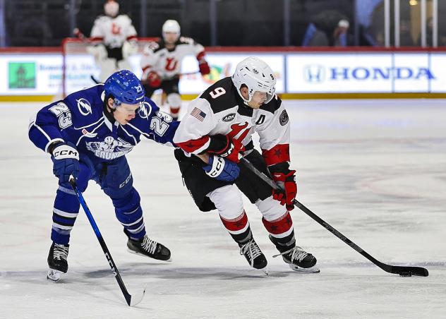 Syracuse Crunch defenseman Maxim Groshev vs. the Utica Comets
