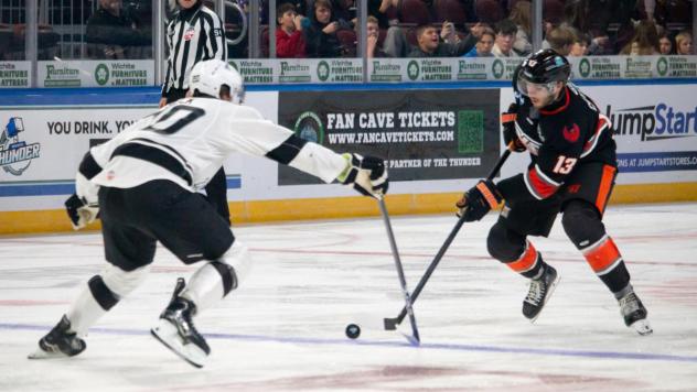 Wichita Thunder defenseman Noah Beck (left) faces the Kansas City Mavericks