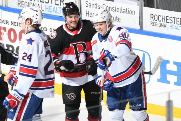 Belleville Senators and Rochester Americans share a laugh