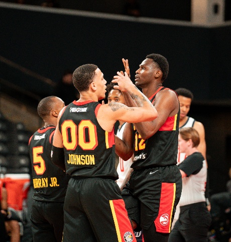 College Park Skyhawks' Dwight Murry, Kobe Johnson, and N'Faly Dante on game night
