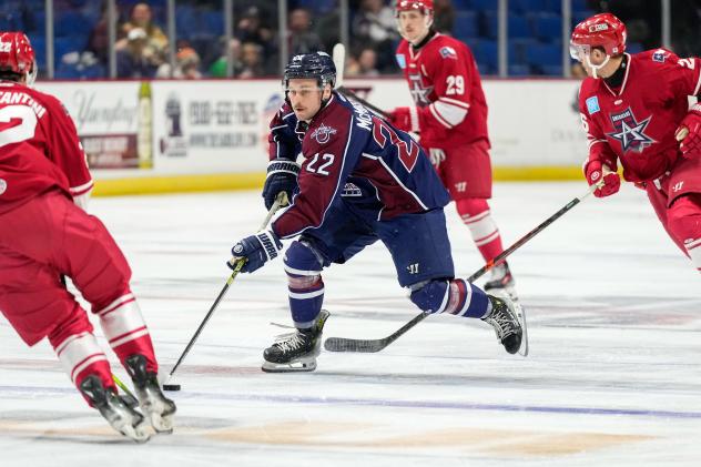 Allen Americans surround the Tulsa Oilers