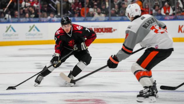 Wichita Thunder's Lucas Vanroboys versus Kansas City Mavericks' Jake McLaughlin