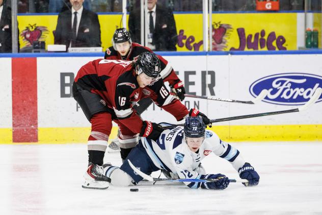 Vancouver Giants' Blake Chorney battles Penticton Vees' Caton Ryan