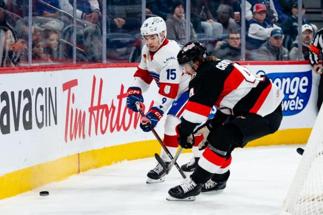 Belleville Senators defenceman Cameron Crotty (right) vs. the Laval Rocket