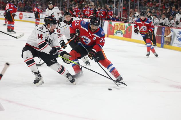 Adirondack Thunder defenseman Conner Hutchison (left) vs. the Indy Fuel