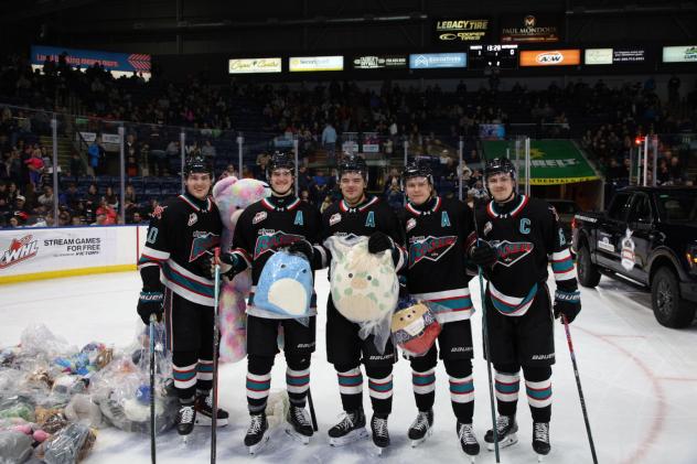 Kelowna Rockets' Tomas Poletin, Nate Corbet, Tij Iginla, Mazden Leslie, and Carson Wetsch on Teddy Bear Toss Night