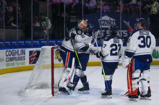 Worcester Railers goaltender Henrik Tikkanen is greeted by the team