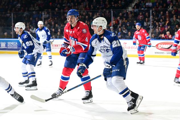 Syracuse Crunch right wing Mitchell Chaffee (right) vs. the Rochester Americans