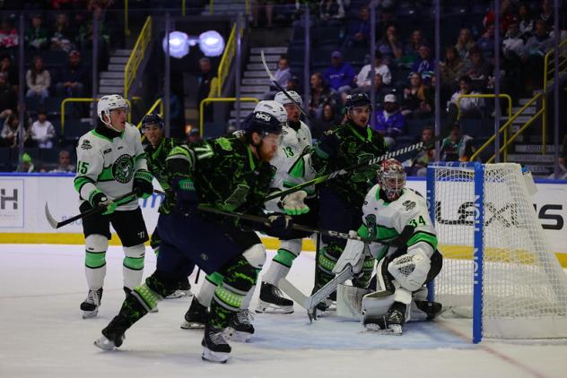 Florida Everblades' Jett Jones battles Savannah Ghost Pirates' Nick Granowicz, Zach Krajnik, and Evan Cormier