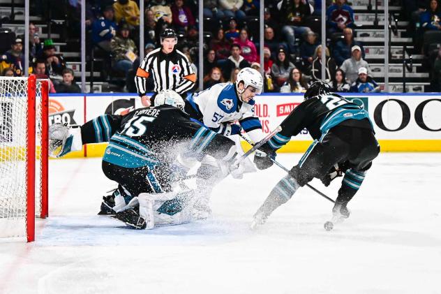 San Jose Barracuda's Gabriel Carriere and Jack Thompson battle Colorado Eagles' Tristen Nielsen
