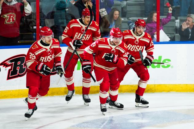 Rapid City Rush's Matt Hubbarde, Xavier Bernard, Parker Bowman, and Bobby Russell on game night