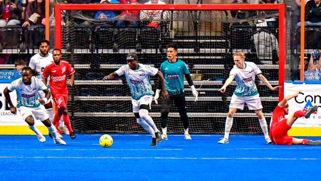 St. Louis Ambush clear the ball away from the goal vs. the Kansas City Comets