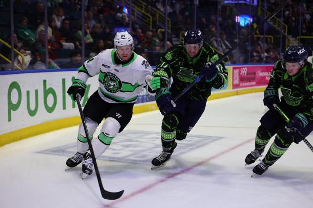 Savannah Ghost Pirates' Will Riedell and Florida Everblades' Oliver Cooper and Kyle Penney in action