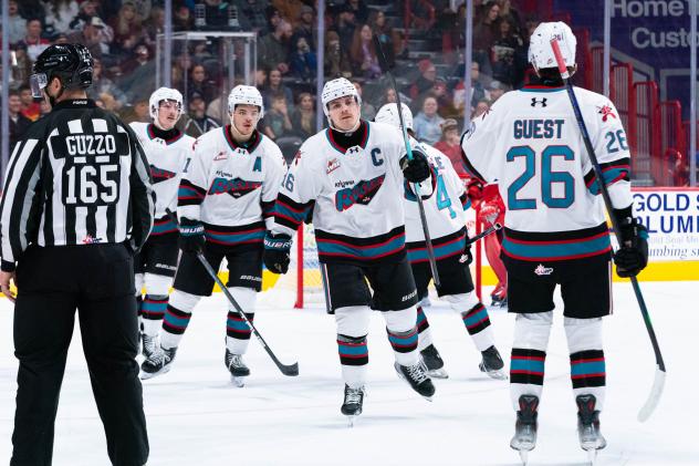 Kelowna Rockets' Tij Iginla, Carson Wetsch, and Rowan Guest on game night