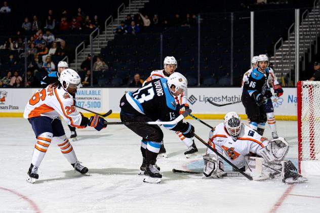 Atlanta Gladiators forward Alex Young takes a shot against the Greenville Swamp Rabbits