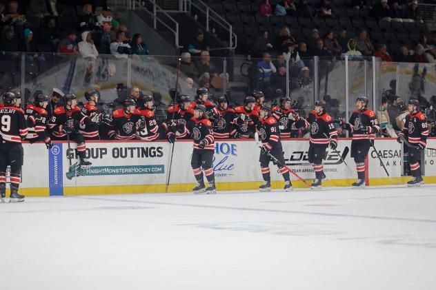 Rapid City Rush exchange congratulations along the bench