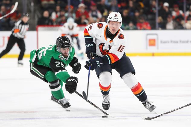 Texas Stars defenseman Michael Karow (left) vs. the Coachella Valley Firebirds